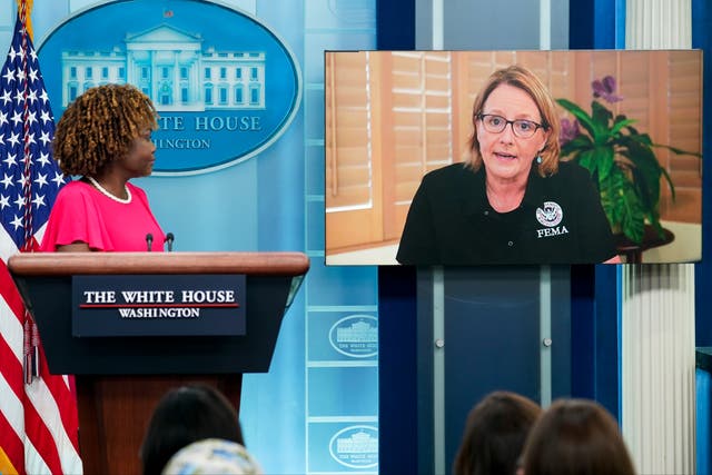 <p>FEMA Administrator Deanne Criswell appears on a screen as she joins White House press secretary Karine Jean-Pierre for a press briefing at the White House</p>