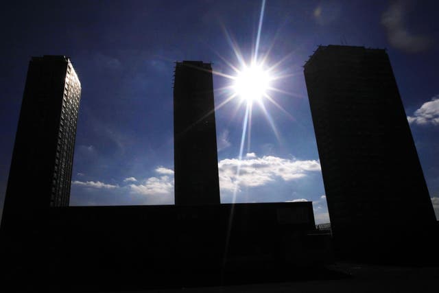 Flats without shade, such as high rises, can overheat during hot summers, say experts (Danny Lawson/PA)