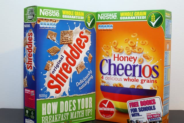 Cereal boxes often use bold colours to grab a customer’s attention (Steve Parsons/PA)