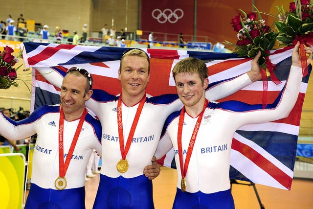Jamie Staff, left, Chris Hoy and Jason Kenny, right, were triumphant in Beijing in 2008 (John Giles/PA)
