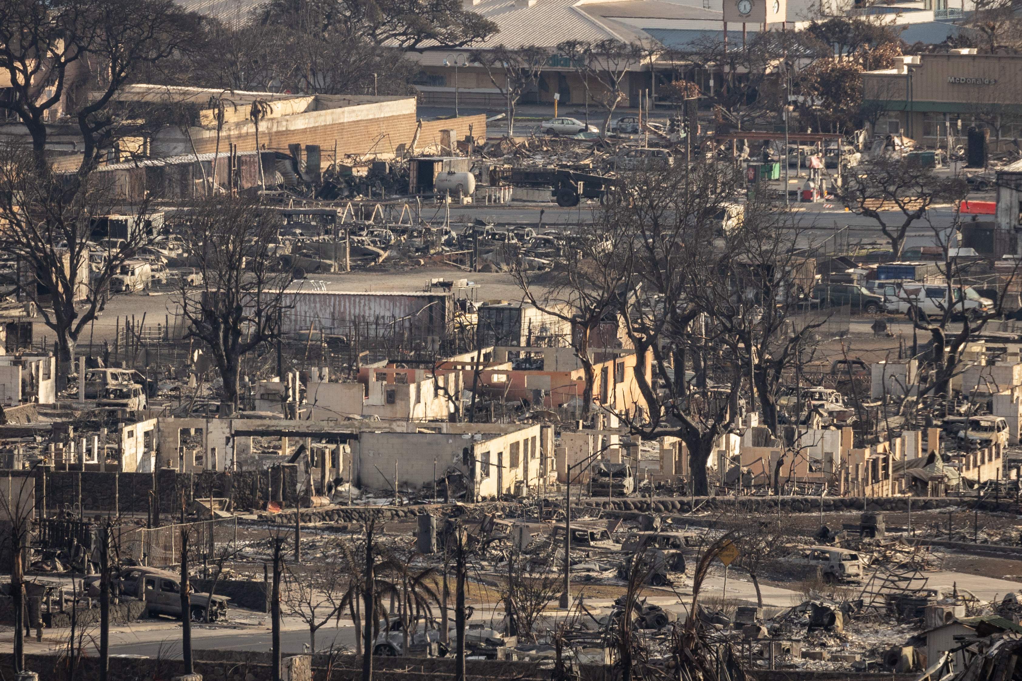 Charred remains of a burned neighbourhood is seen in the aftermath of a wildfire, in Lahaina, western Maui, Hawaii on August 14