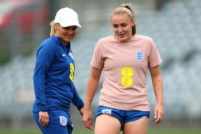 <p>Coach Sarina Wiegman and  Georgia Stanway during a World Cup training session  </p>