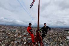 Thrill-seekers scale 520ft Blackpool Tower for stunning Red Arrows selfie