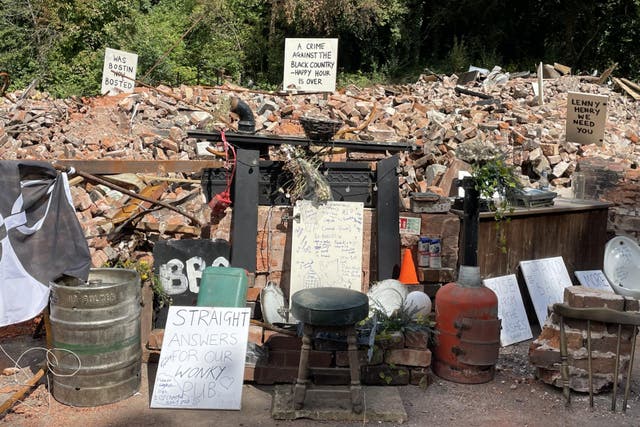 Rubble left after the demolition of the Crooked House pub (Matthew Cooper/PA)