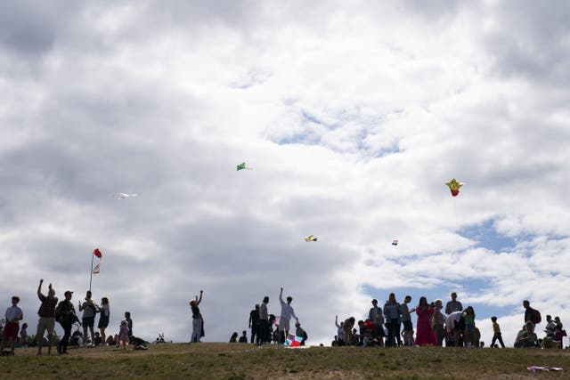 People fly their kites on Hampstead Heath (Kirsty O’Connor/PA)