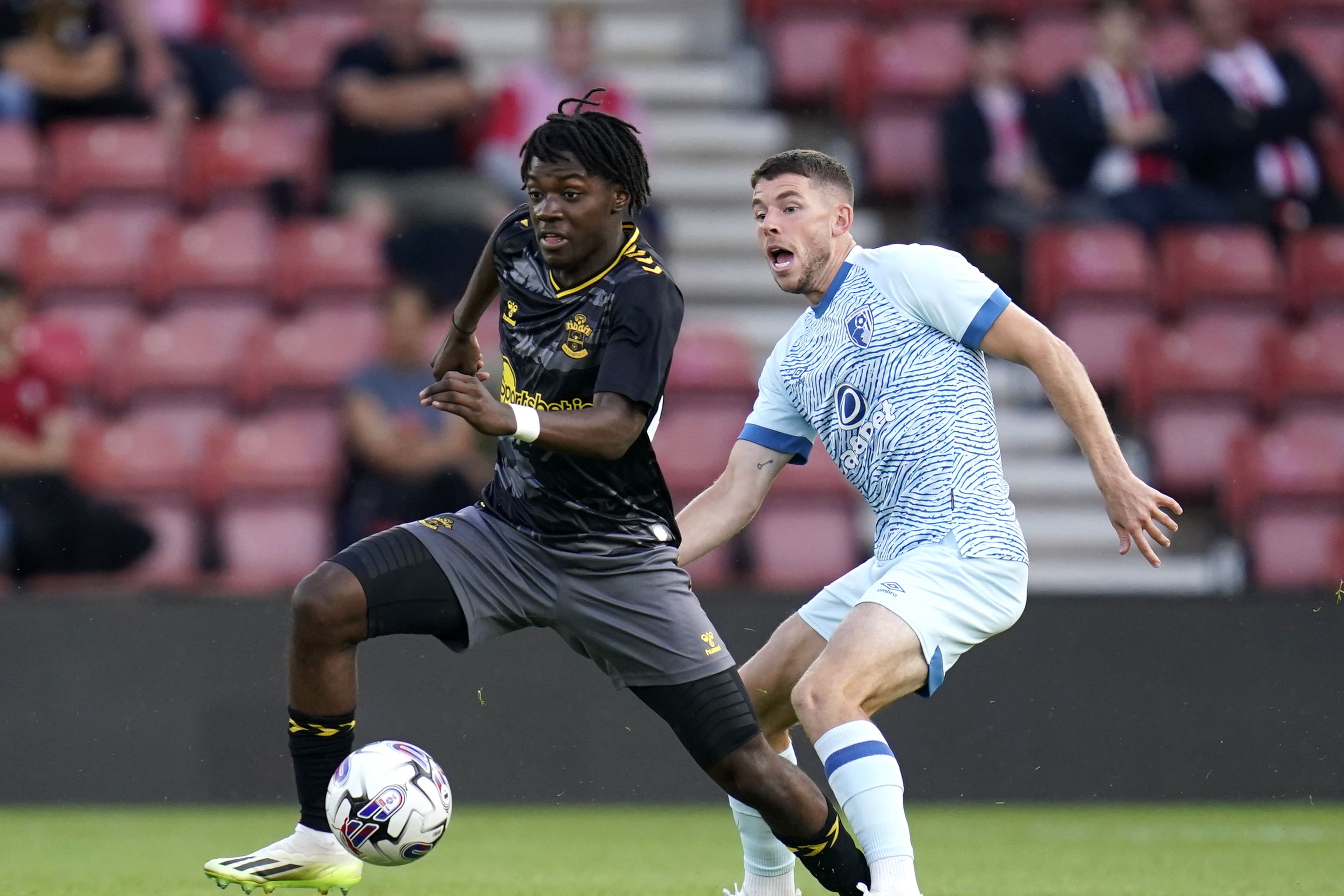 Southampton’s Romeo Lavia, left, is set for a move to Chelsea (Andrew Matthews/PA)