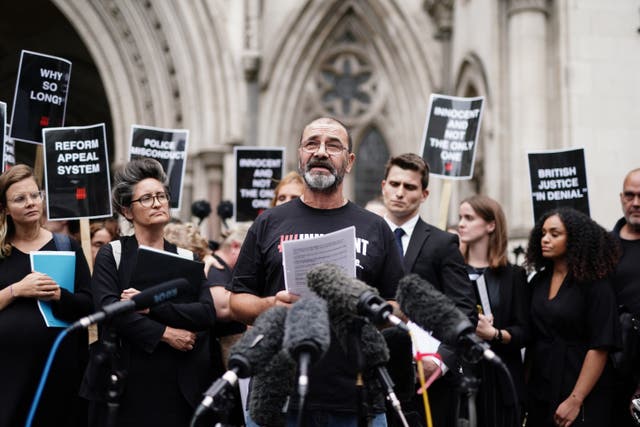 Andrew Malkinson, who served 17 years in prison for a rape he did not commit, reads a statement outside the Royal Courts of Justice in London, after being cleared by the Court of Appeal (PA)