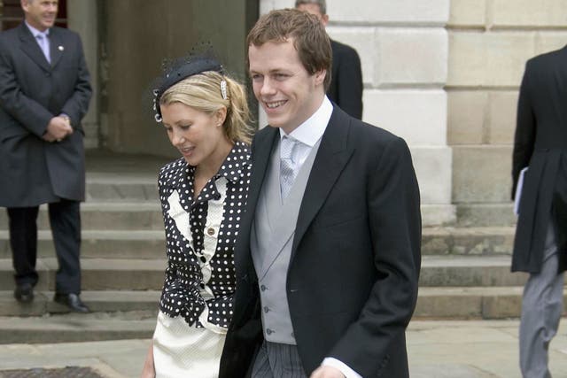 <p>Tom Parker Bowles and his fiancee Sara Buys leave the Civil Ceremony for the marriage of HRH Prince Charles, the Prince of Wales, and Tom's mother, Camilla, the Duchess of Cornwall, at The Guildhall, Windsor on April 9, 2005</p>