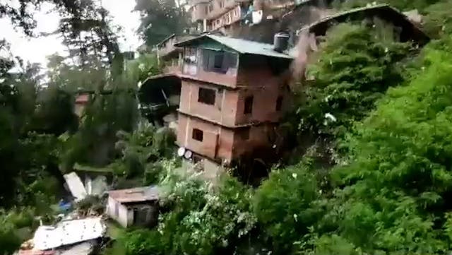 <p>Moment homes destroyed as huge landslide carves cliff away in Himachal</p>