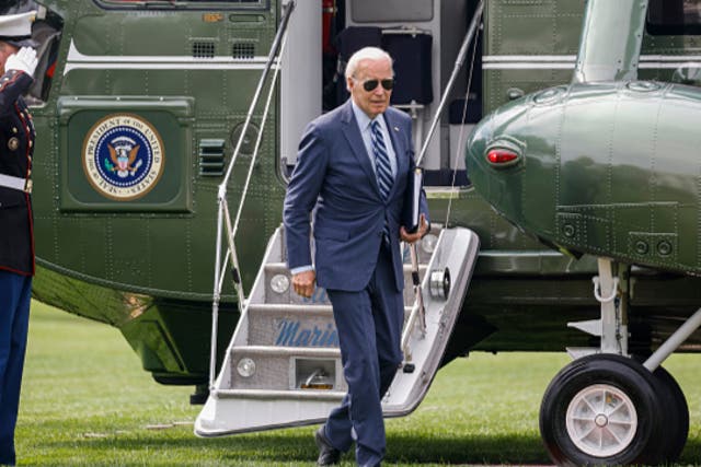 <p>President Joe Biden walks off Marine One on the South Lawn of the White House on August 14, 2023 </p>