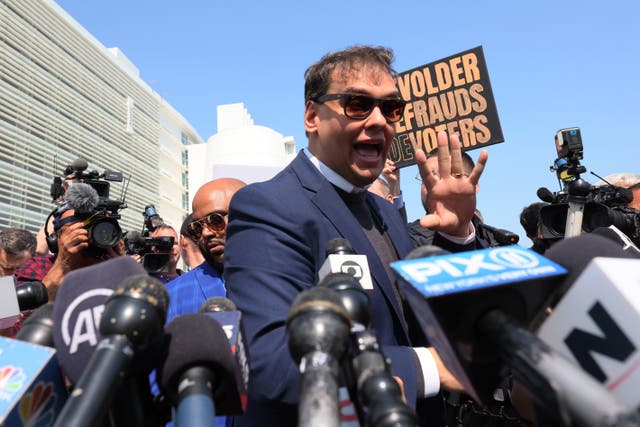 <p>Rep. George Santos (R-NY) speaks with members of the press as he leaves Federal Court on May 10, 2023 in Central Islip, New York</p>