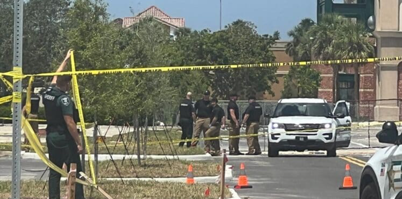 Police on the scene of a shooting in Gulf Coast Town Center, Florida, on Wednesday morning