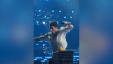 Nick Jonas falls through hole on stage at opening Jonas Brothers concert in Boston