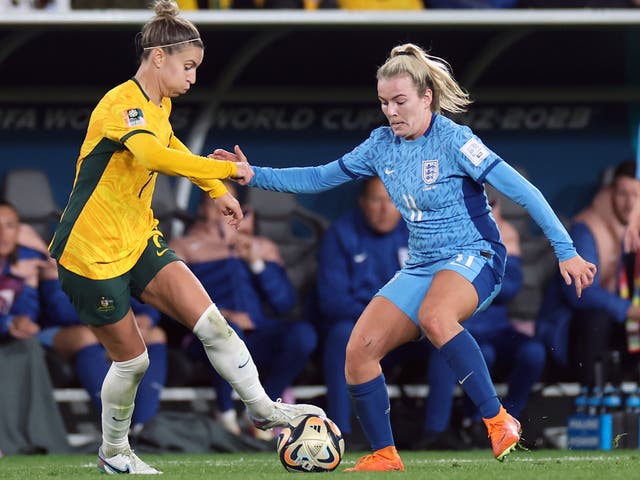 <p>Australia’s Steph Catley and England’s Lauren Hemp (right) </p>