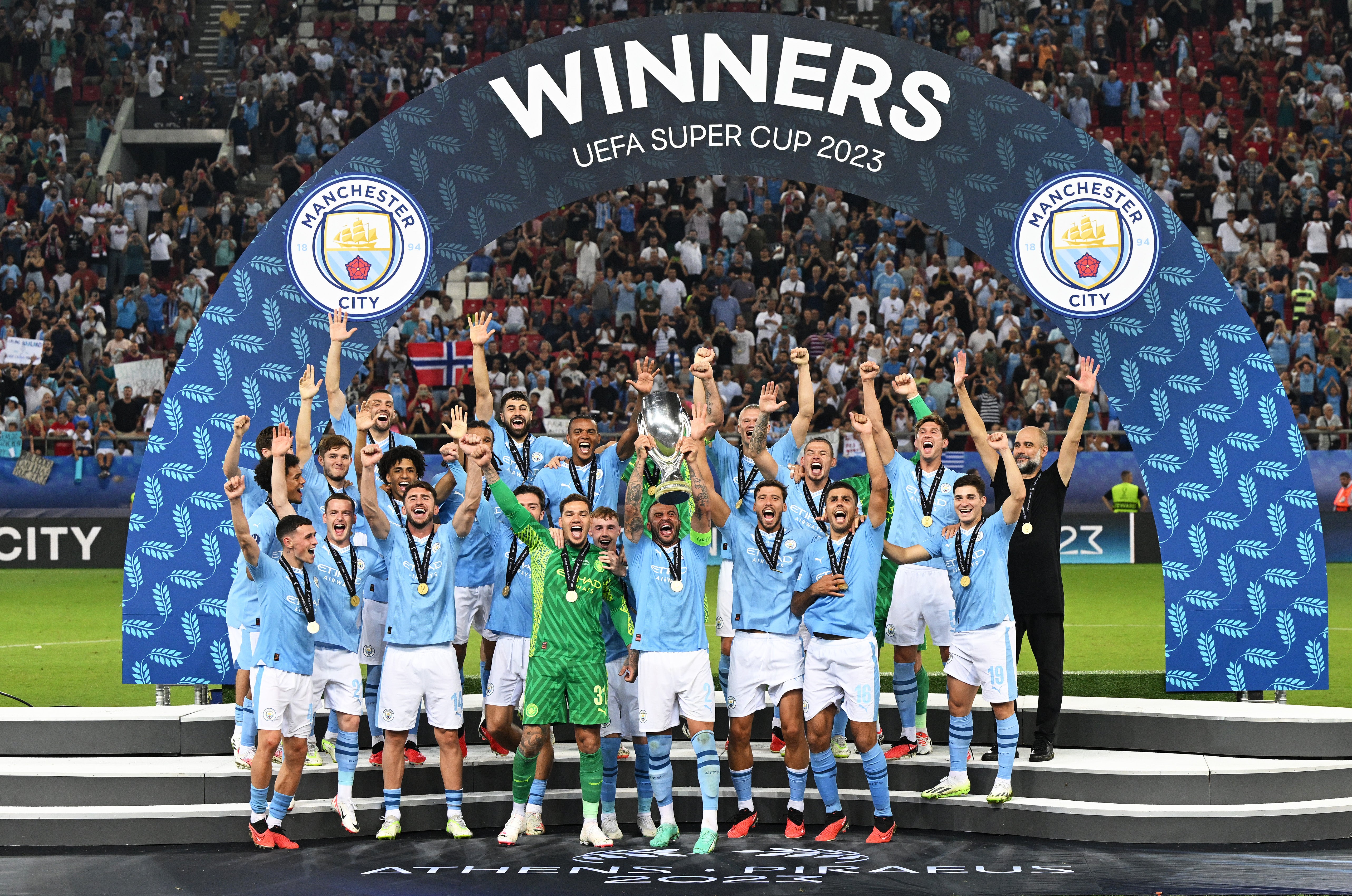 Manchester City celebrate their first trophy of the season in Athens