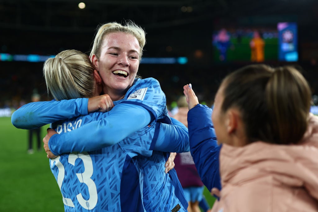 Hemp celebrates with Russo after England’s win against Australia