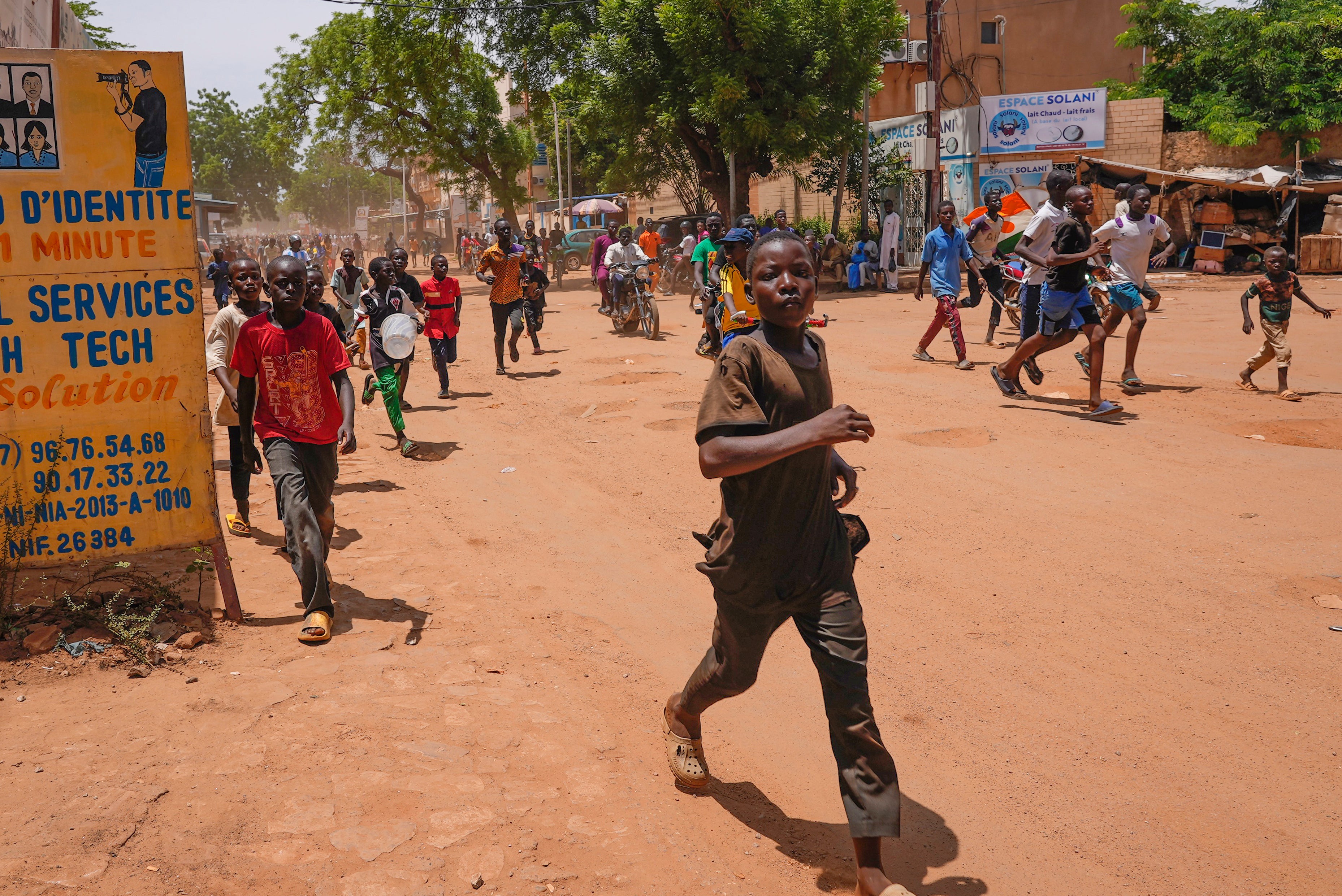 Children run in the streets of Niamey, Niger