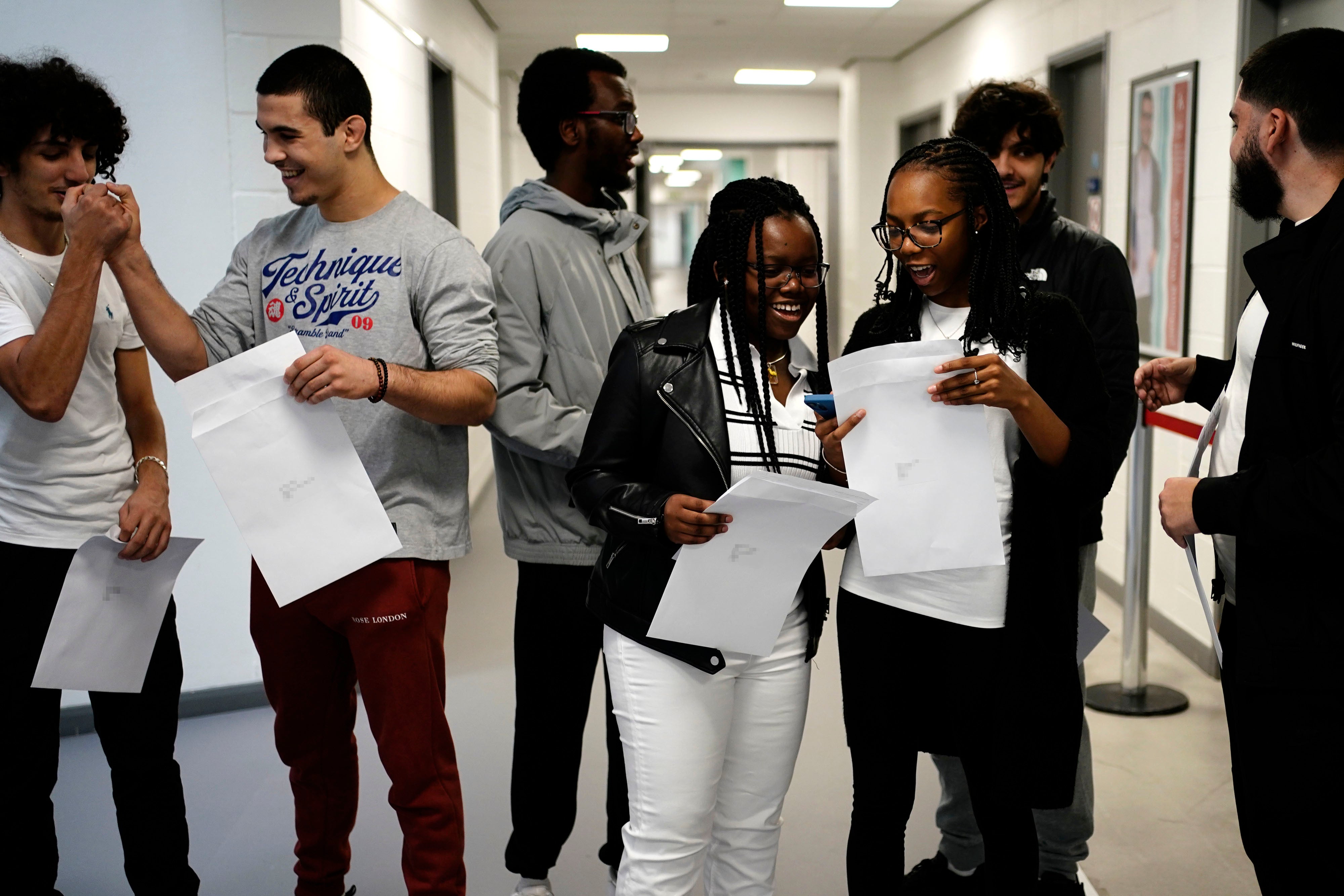 Students at Ark Acton Academy in Acton, west London, receive their A-level results