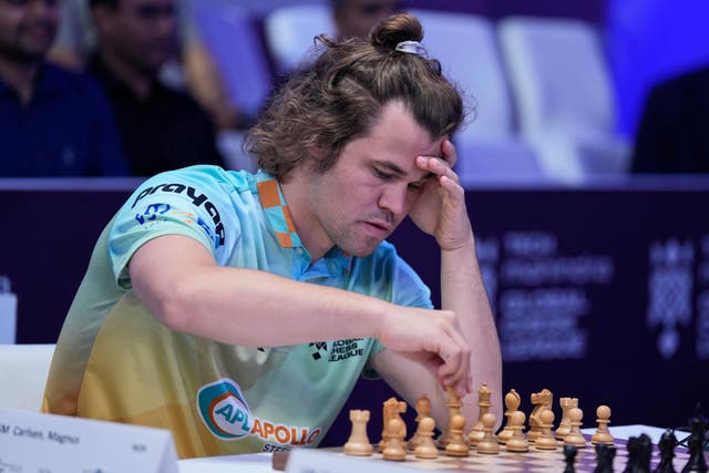 Magnus Carlsen blames opponent's wristwatch for Qatar Masters Chess event  loss