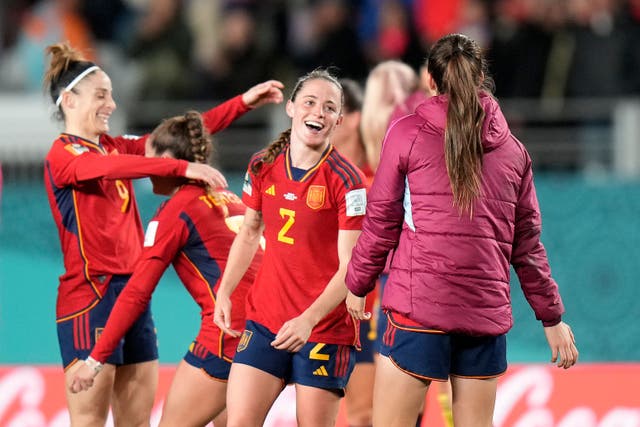 Spain’s players celebrate reaching the Women’s World Cup final (Alessandra Tarantino/AP/PA)
