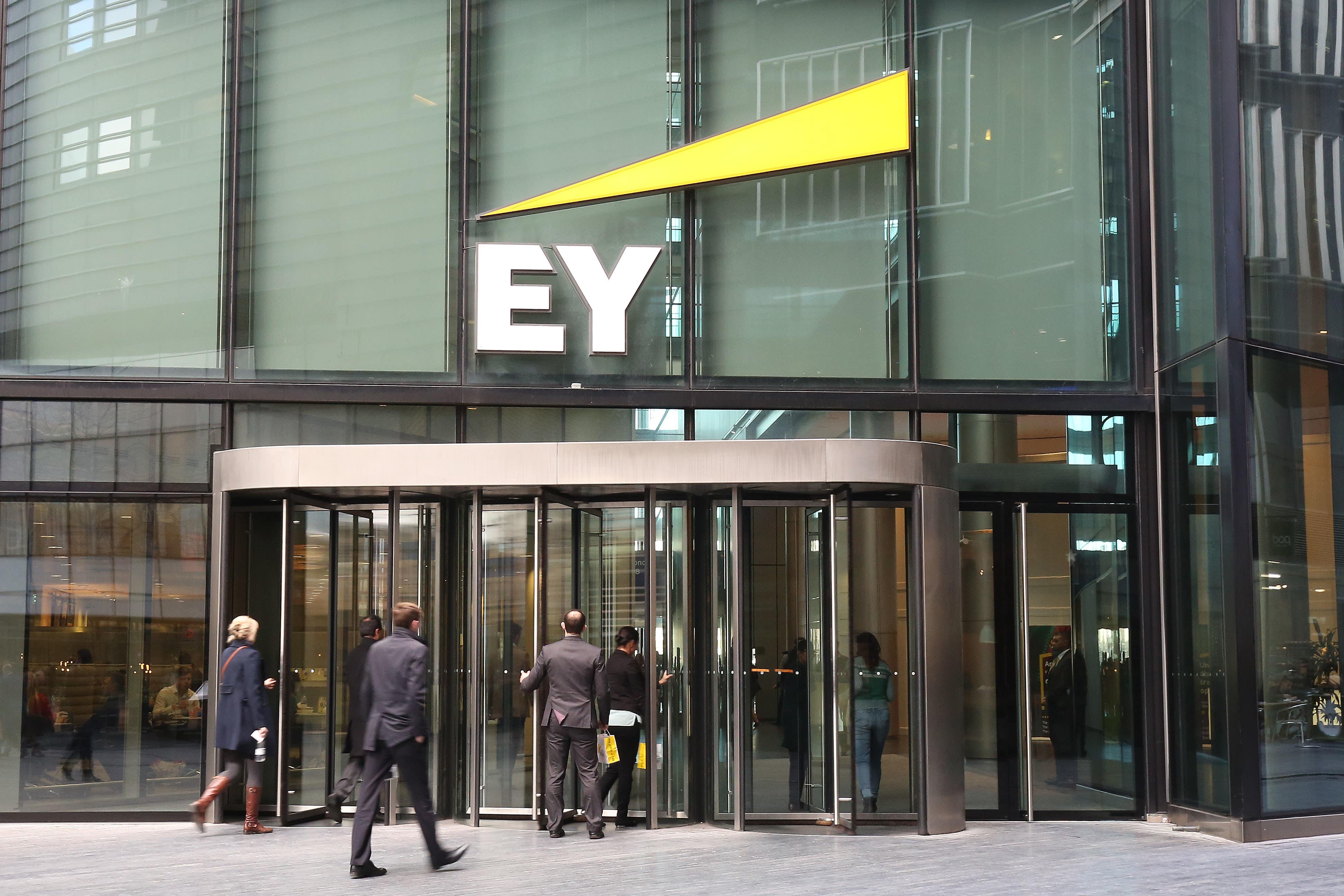 EY is to cut jobs in its financial services consulting business (Philip Toscano/PA)