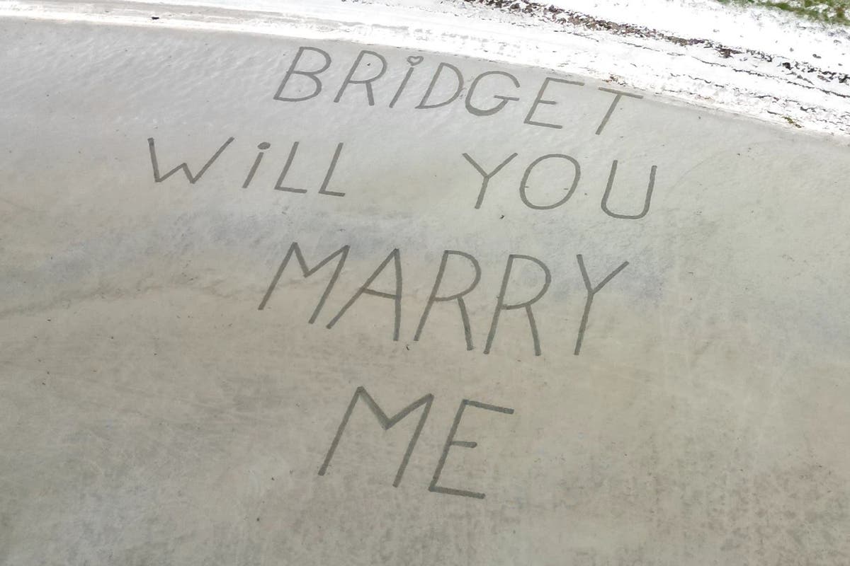 Marriage proposal etched into runway sand for man’s sky-high proposal