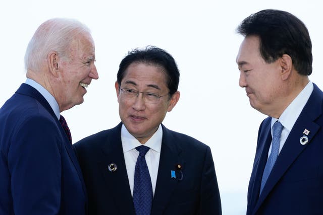 <p>File: Joe Biden (left) is due to host Japan’s Fumio Kishida (centre) and South Korea’s Yoon Suk-yeol (right) for an historic trilateral summit </p>