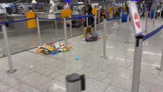 Litter scattered in Frankfurt airport after flooding prompts flight cancellations
