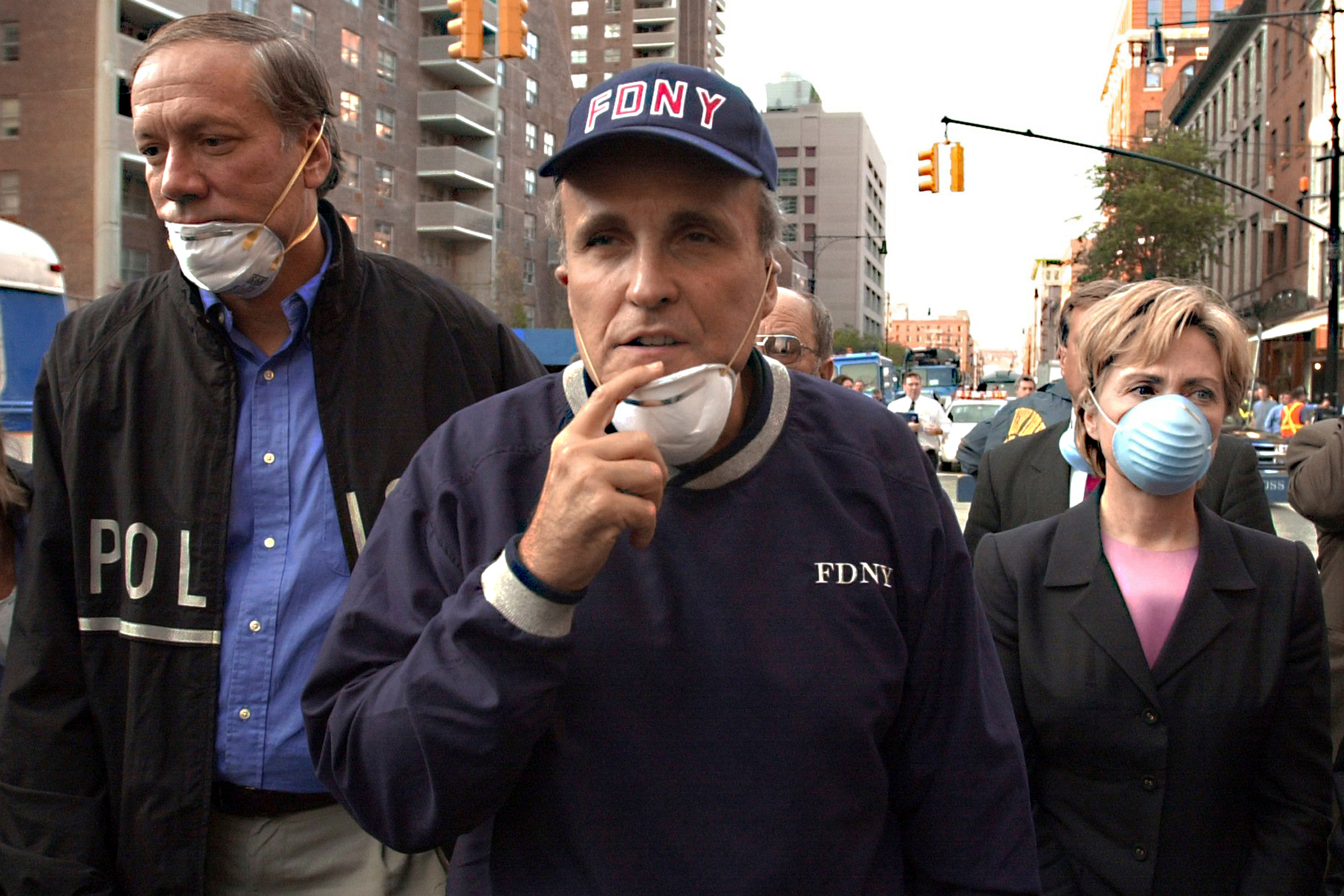 New York Mayor Rudy Giuliani leads a tour of the site of the World Trade Center terror attack on September 12, 2001. On 2 July, 2024, he was disbarred in New York.