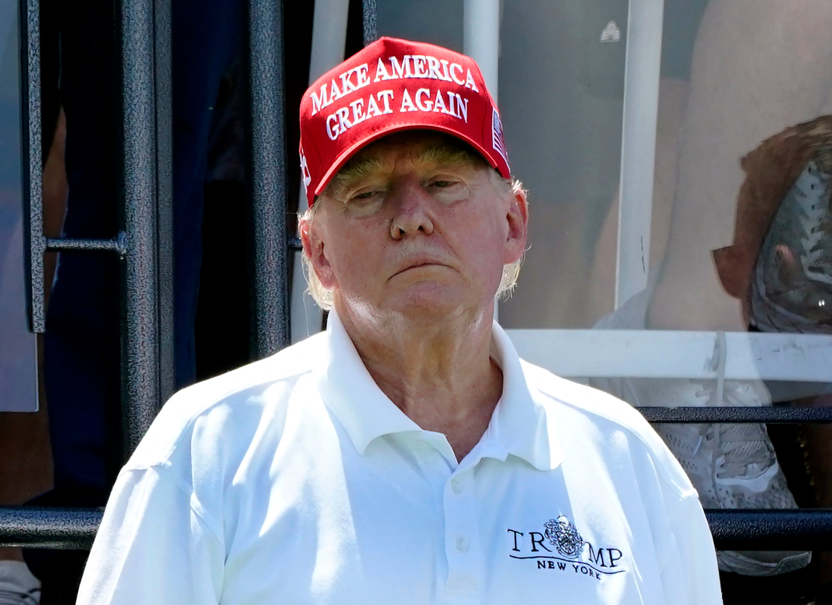 Former US President Donald Trump looks on during Round 3 at the LIV Golf-Bedminster 2023 at the Trump National in Bedminster, New Jersey on August 13, 2023.