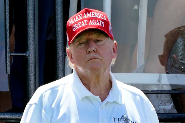 <p>Former US President Donald Trump looks on during Round 3 at the LIV Golf-Bedminster 2023 at the Trump National in Bedminster, New Jersey on August 13, 2023. </p>