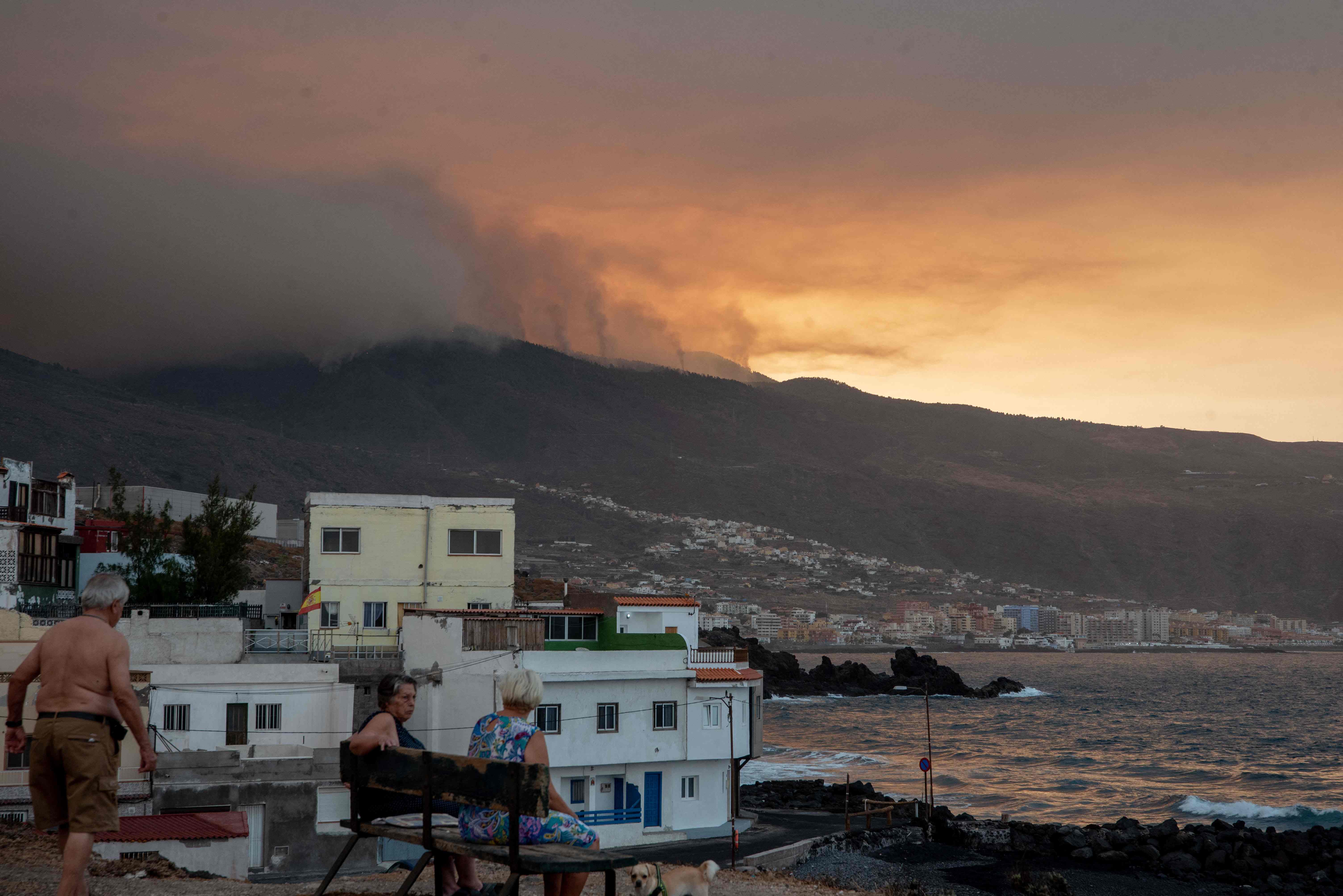 A cloud of smoke billows over the village of Candelaria on 17 August
