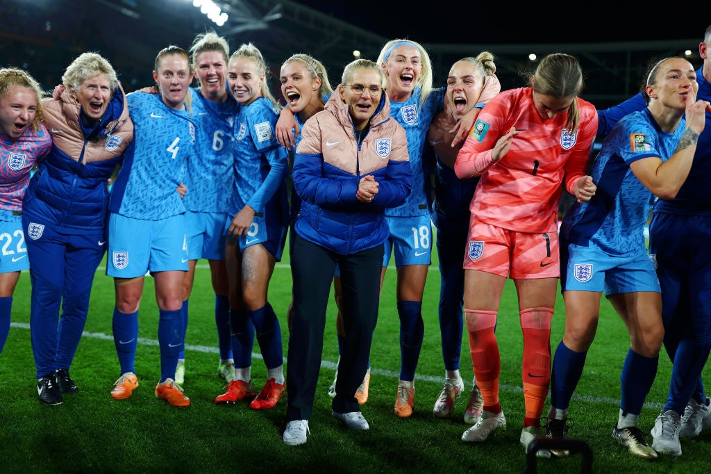 England manager Sarina Wiegman huddled with her team after going through to the Women’s World Cup final, scoring 3-1 against Australia