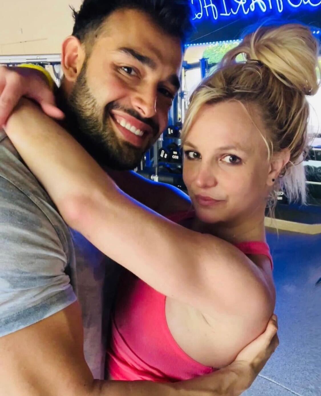 Sam Asghari and Britney Spears embrace in an Instagram post shared to the pop star’s social media account