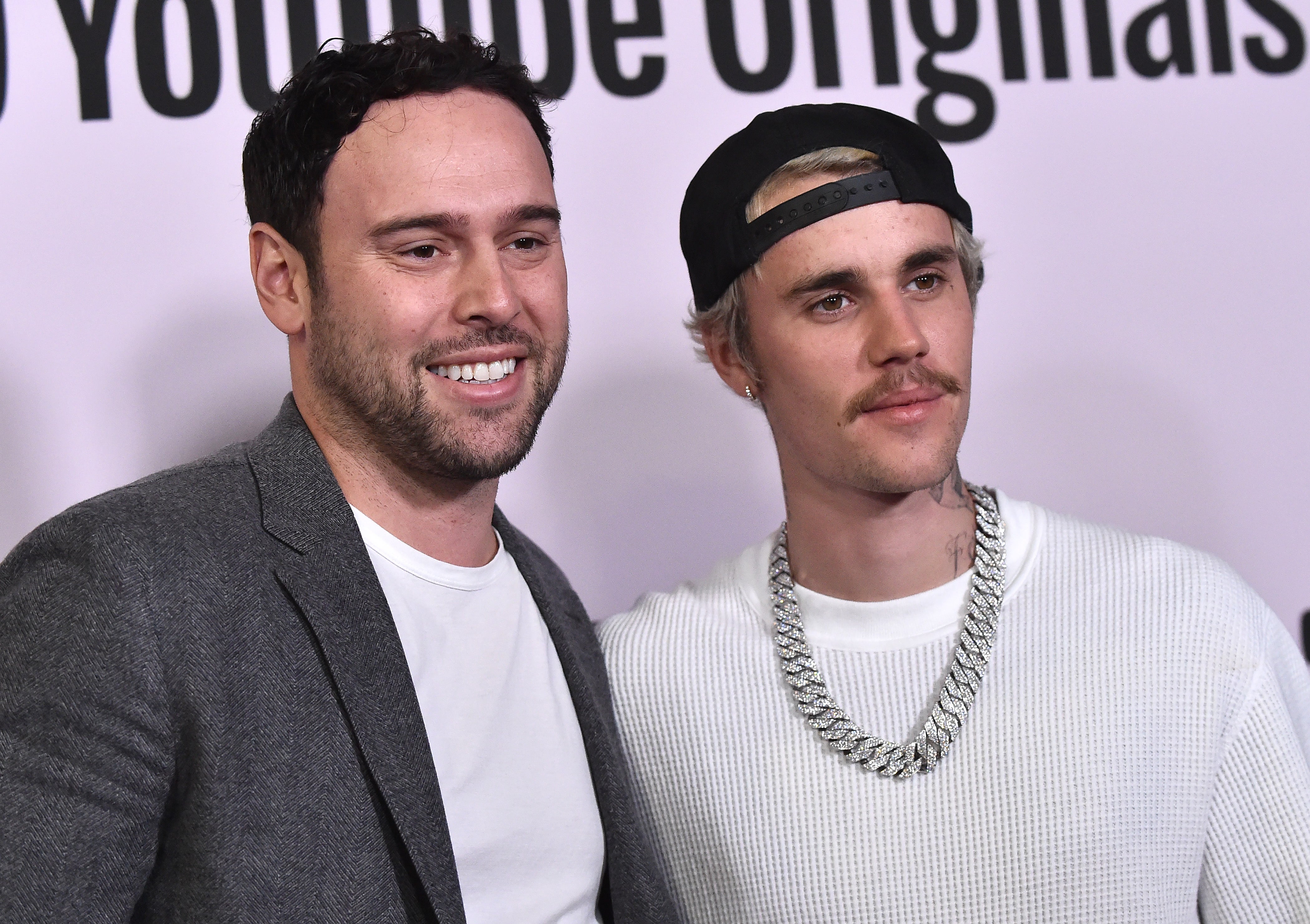 Scooter Braun (left) and Justin Bieber