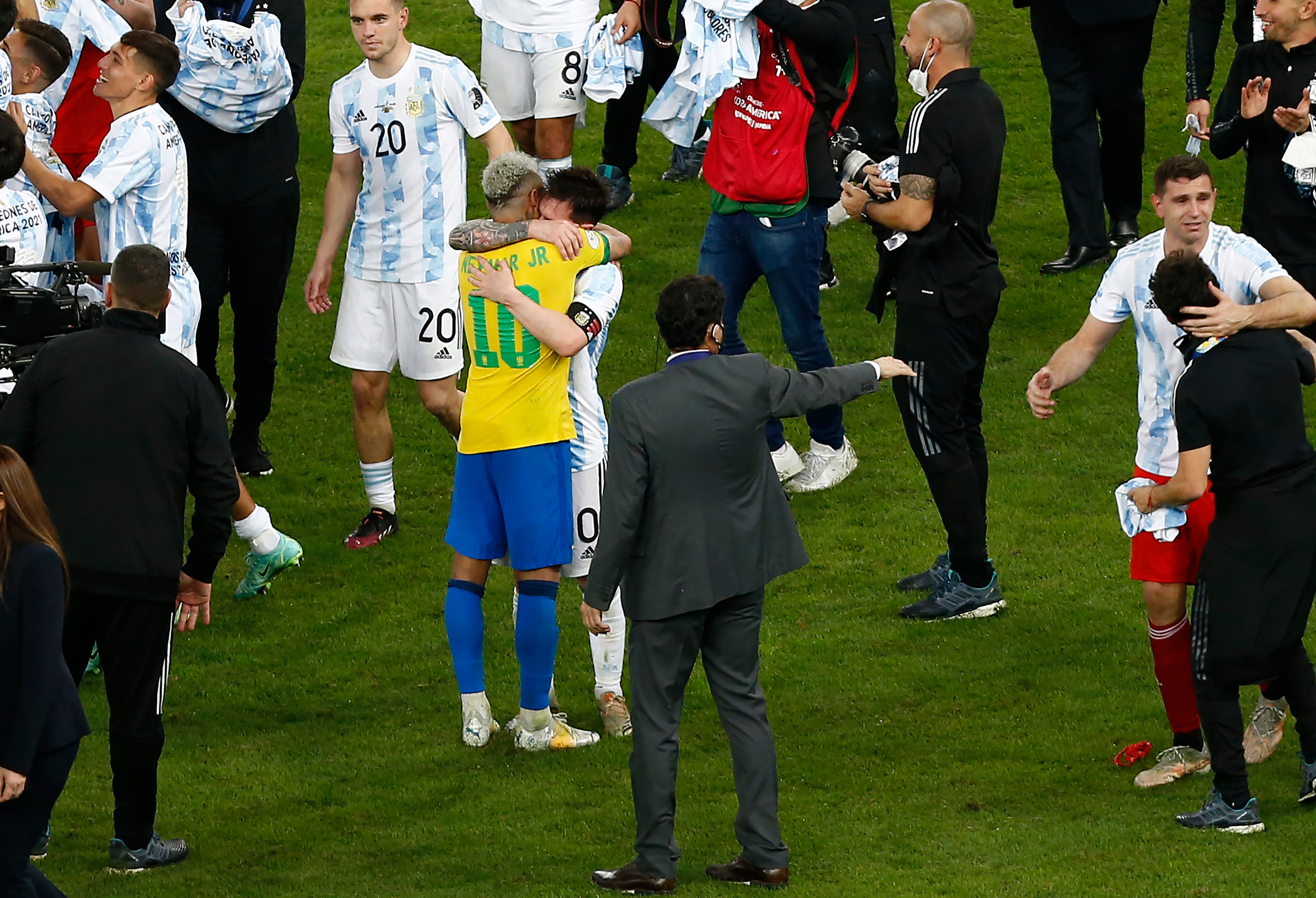 Neymar and Lionel Messi embrace at the end of the 2021 Copa America final