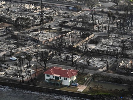 The red-roofed house on Front Street in the historic Hawaiian town of Lahaina was spared during deadly wildfires earlier this month