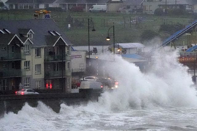 Waves crash against the sea wall in Tramore, County Waterford, as Storm Betty brings strong winds and rain as well as the threat of flooding across Ireland (Niall Carson/PA)