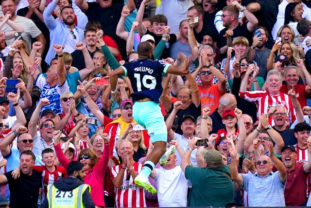 Brentford’s Bryan Mbeumo bagged a brace in the win at 10-man Fulham (Adam Davy/PA)