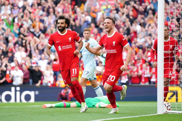 Liverpool’s Diogo Jota (centre right) celebrates scoring (Peter Byrne/PA)