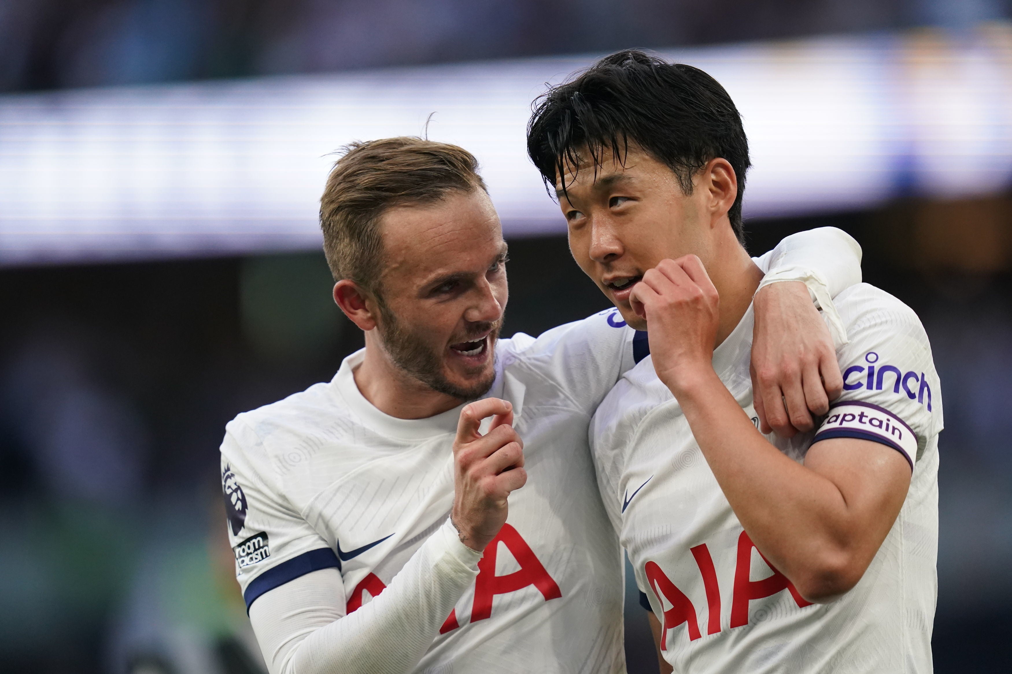 James Maddison and Son Heung-min embrace at full-time