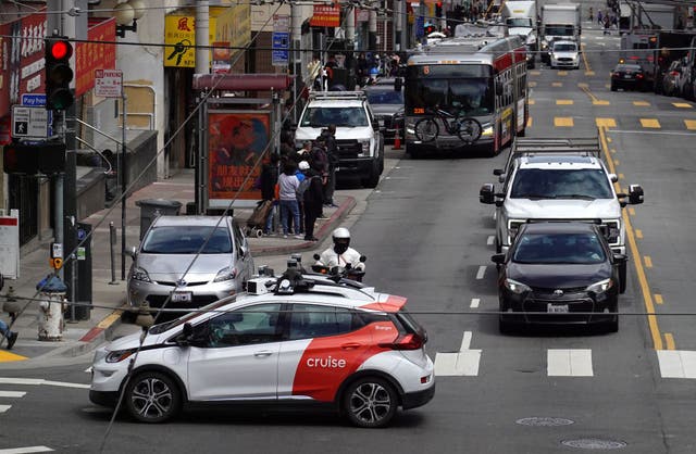 <p>A Chevrolet Cruise autonomous vehicle with a driver moves through an intersection on June 08, 2023 in San Francisco</p>