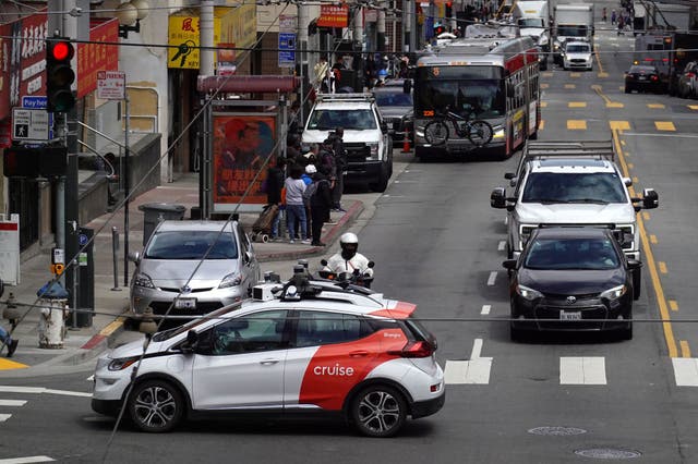 <p>A Chevrolet Cruise autonomous vehicle with a driver moves through an intersection on June 08, 2023 in San Francisco</p>