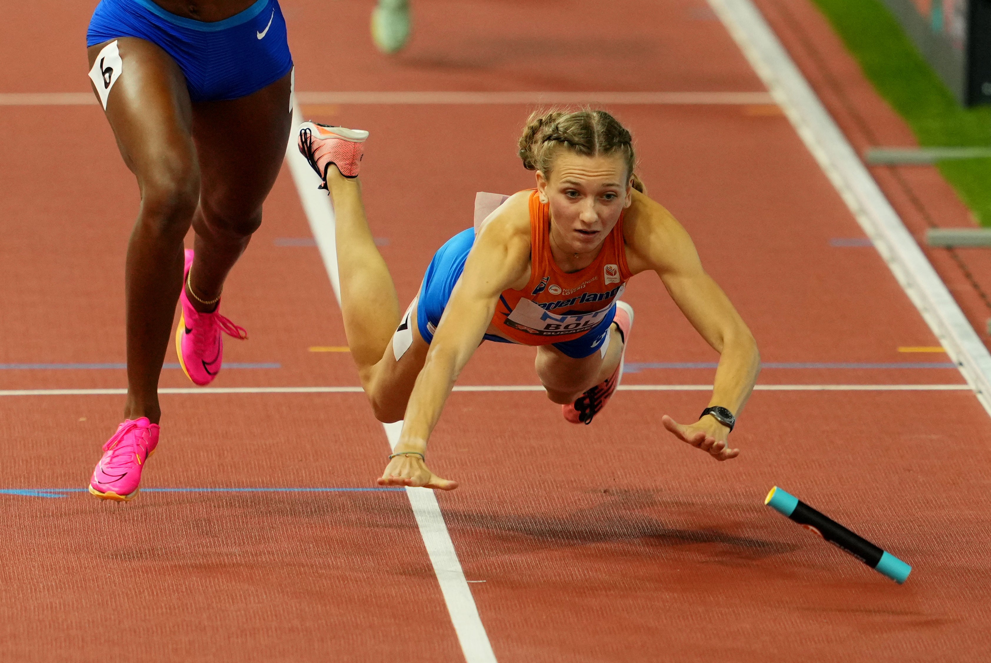 <p>Femke Bol fell over at the end of the 4x400 mixed relay to miss out on a medal </p>