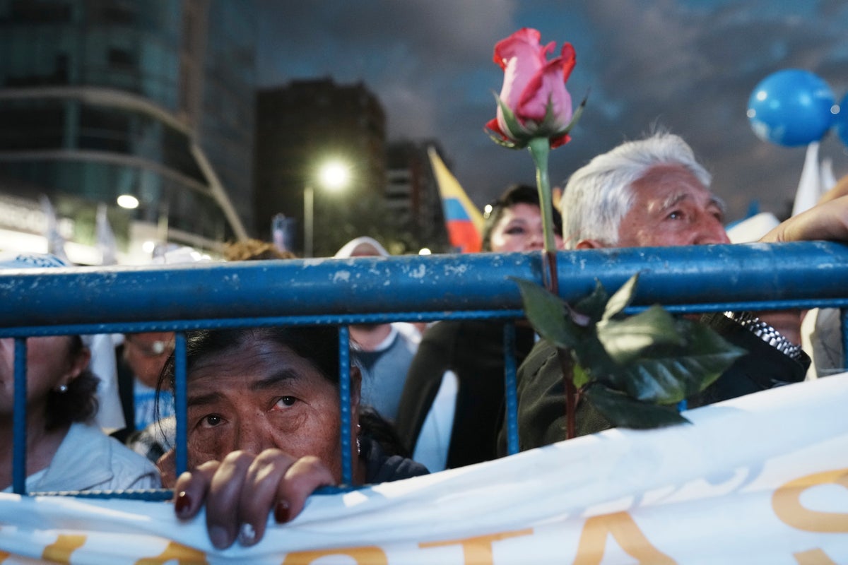 Ecuadorians choosing a new president amid increasing violence that may scare away voters