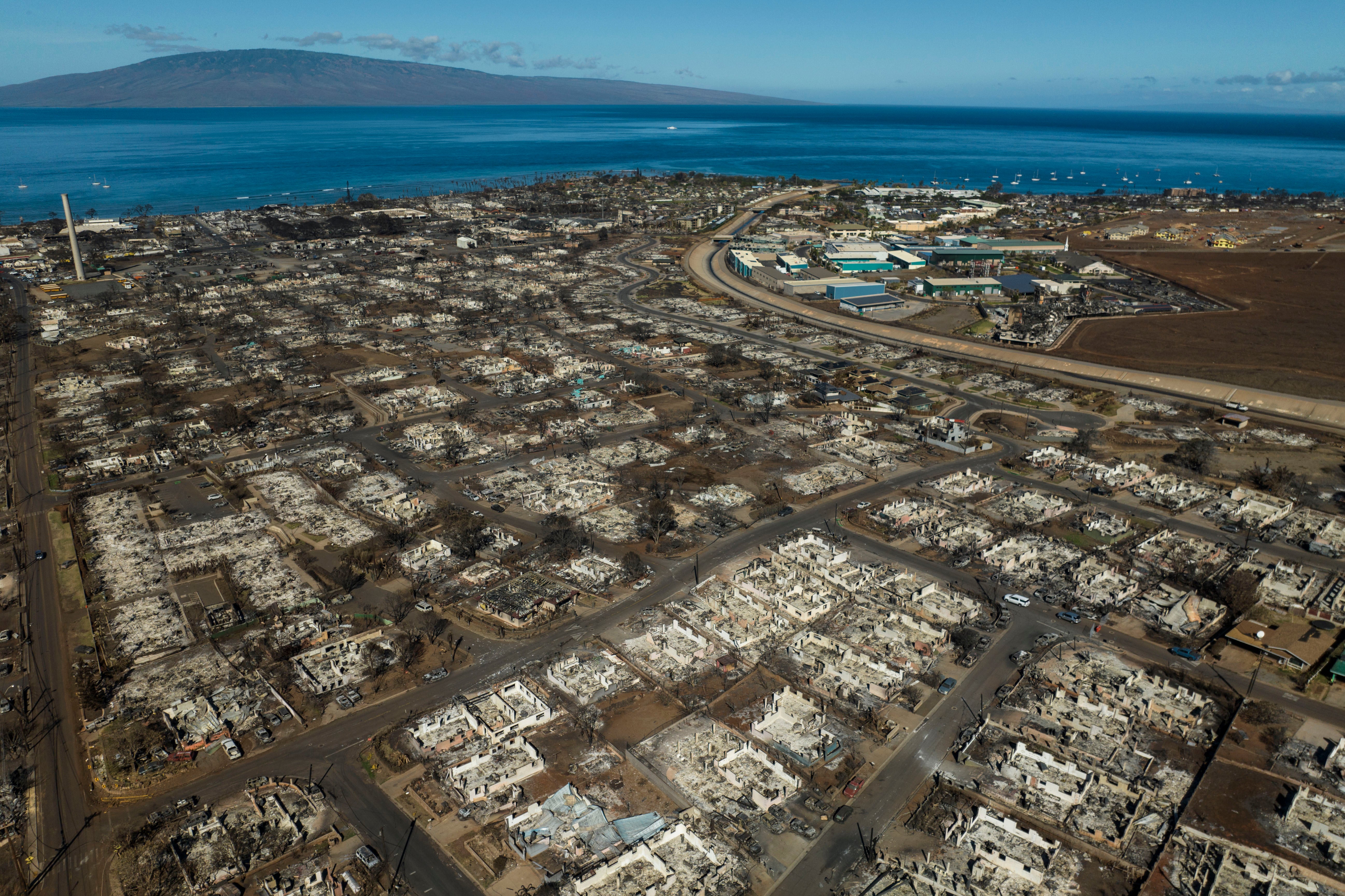 The aftermath of a wildfire is visible in Lahaina