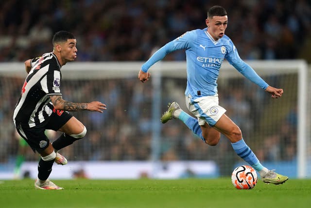Phil Foden (right) shone as Manchester City beat Newcastle (Nick Potts/PA)