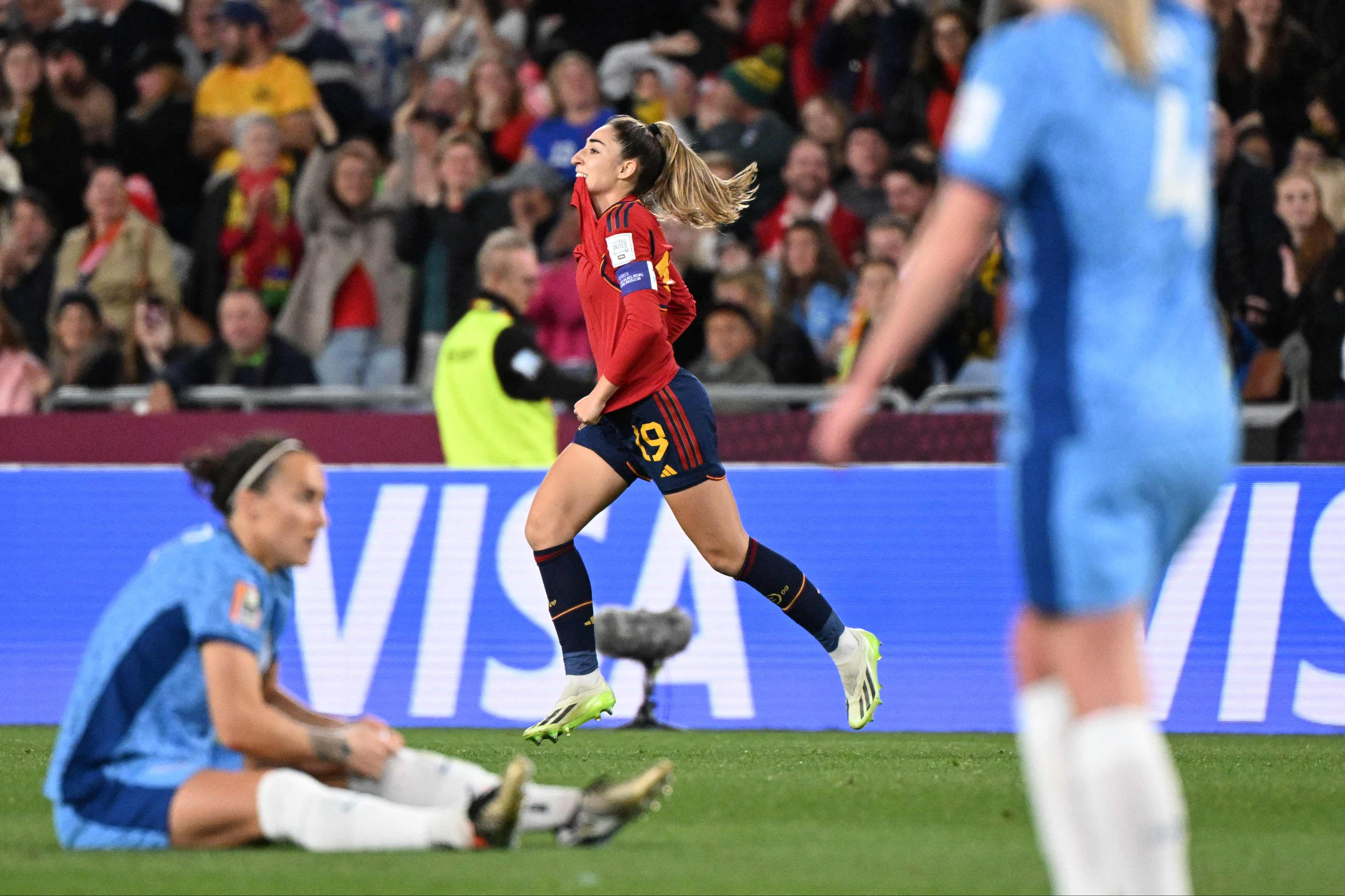 Olga Carmona celebrates scoring for Spain