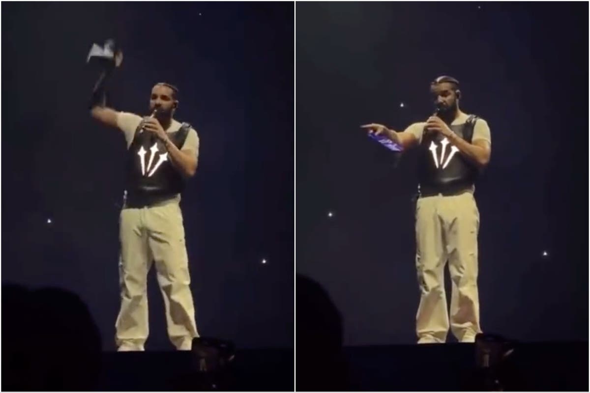 Drake issues warning after fan throws book at his head on stage