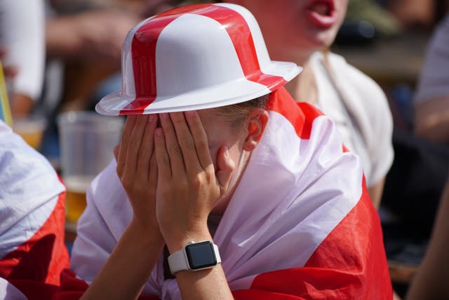 A England fan reacts to the penalty given to Spain (Peter Byrne/PA)